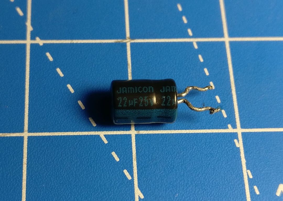 A close-up picture of one of the bad capacitors